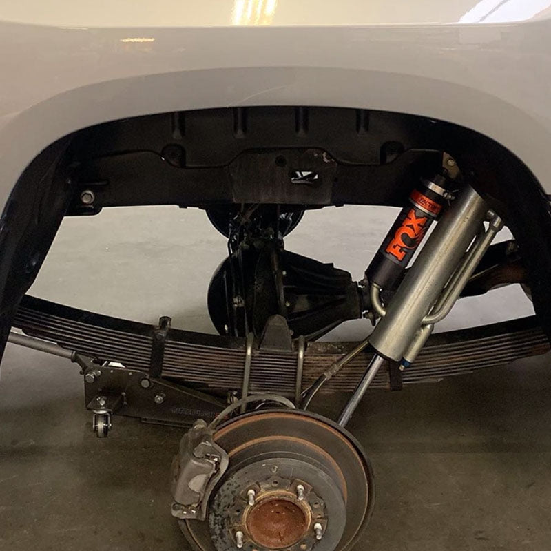 Camburg Toyota Tundra 07-21 rear shock mount kit with camber plates, designed for 2WD and 4WD trucks, in black and metal finish.