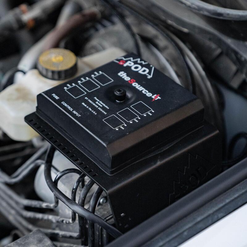 sPOD 2024+ Toyota Tacoma Mini6 SourceLT Power Management System switch panel installed in a vehicle interior