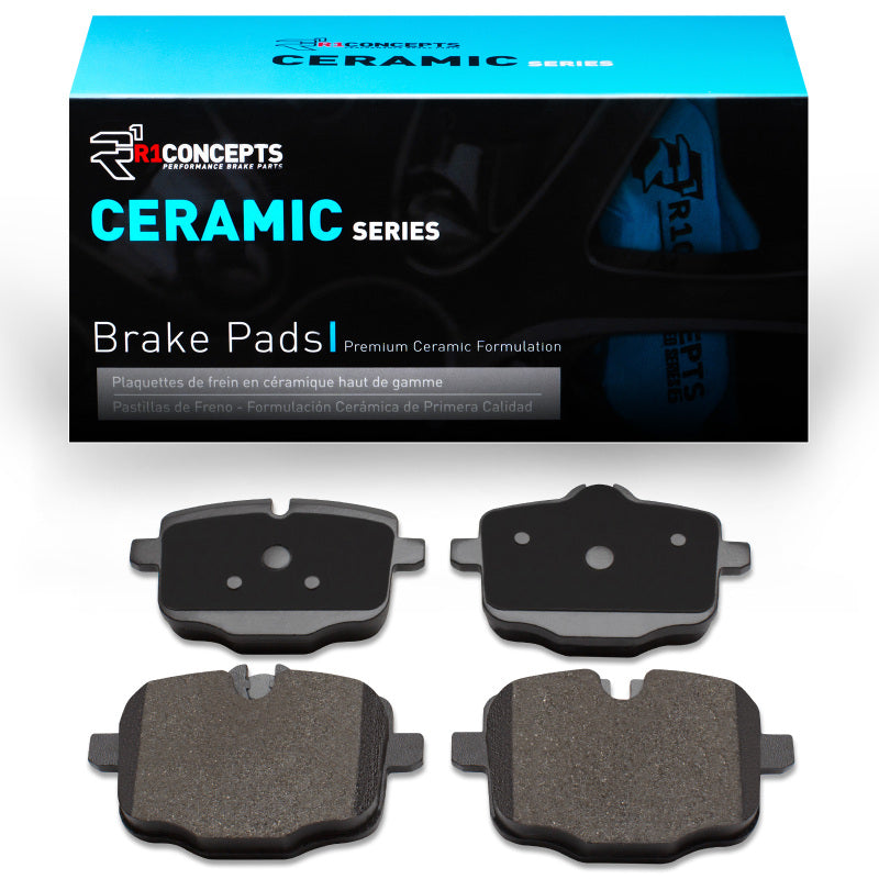 BMW 650i coupe rear R1 Concepts ceramic brake pads, OE quality, with visible brake pad components and packaging.