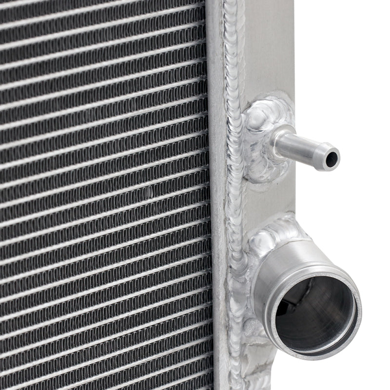 Mishimoto aluminum radiator for Toyota 4-Runner and GX470 4.7L engine, featuring a sleek, polished finish and multiple cooling fins.