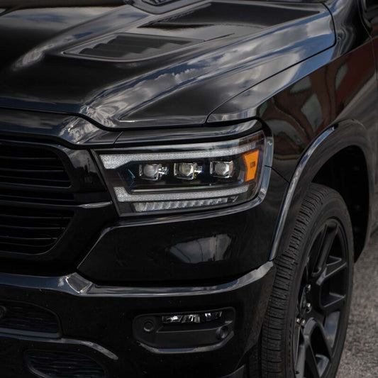 Pair of FORM Lighting Ram 1500 sequential LED projector headlights for 2019-2024 models, featuring modern LED design.