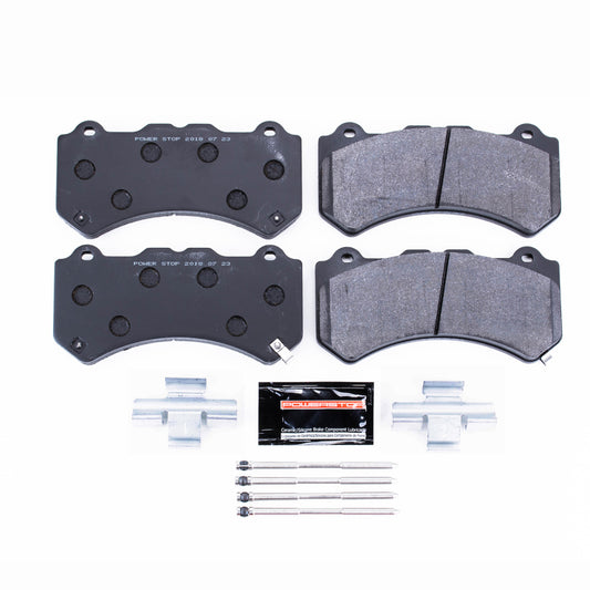 PowerStop racing front track day brake pads installed in a Nissan GT-R, designed for high-performance braking and racing conditions.