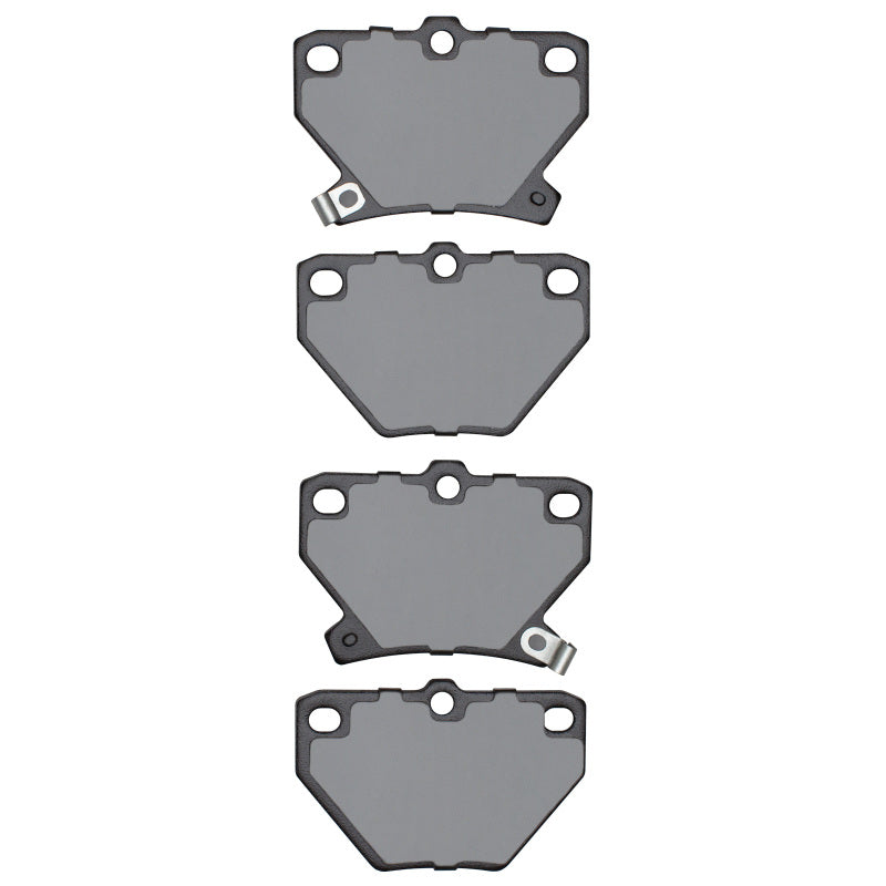 R1 Concepts OE brake pads for Pontiac Vibe R1 00-08 rear, showing close-up of brake pad surface and mounting hardware.
