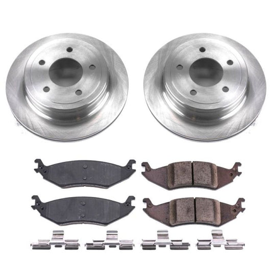 PowerStop OE rear brake kit for Ford E-150 2004-2006, showing brake rotors and pads installed on vehicle rear axle.