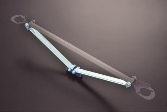 Cusco OS-T Rear Strut Bar for Toyota IS300 SXE10, black metal automotive suspension upgrade component.