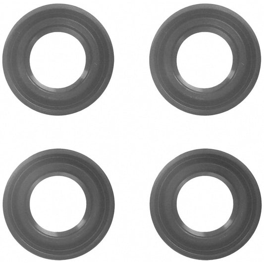 Fel-Pro Toyota Tacoma spark plug tube seal set showing rubber seals and metal components for engine spark plug maintenance.