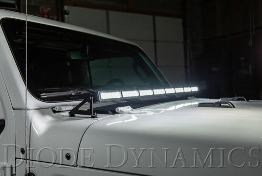 Diode Dynamics Jeep JL Wrangler/Gladiator hood bracket kit with light bars and cubes installed on the vehicle's hood.