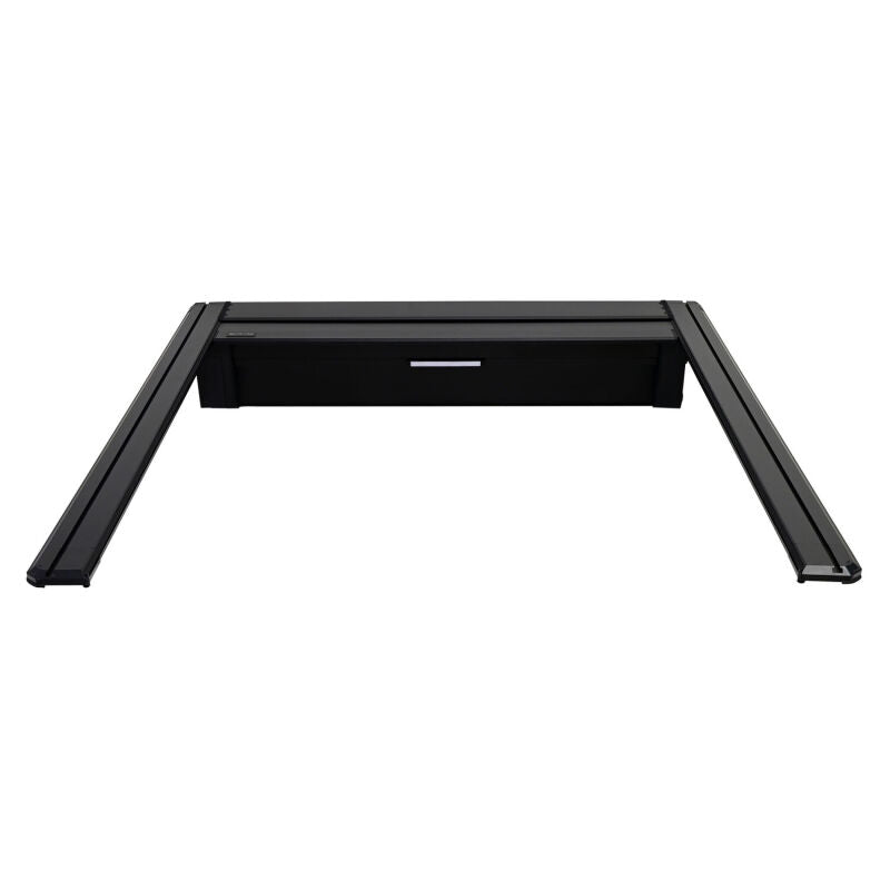 Westin electric retractable tonneau cover on a 2019-2026 Ram 1500 with a 6.4ft bed, black finish, installed on the truck bed.