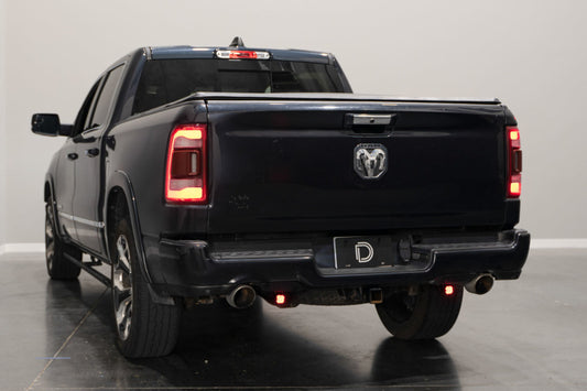Diode Dynamics Stage Series reverse light mounting kit for 2019-present Ram trucks, showing metal brackets and mounting hardware.