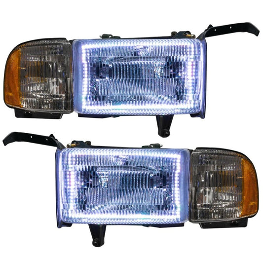 Oracle Lighting Dodge Ram 94-02 pre-assembled Halo headlights with ColorSHIFT LEDs and BC1 controller, showing illuminated halo rings.