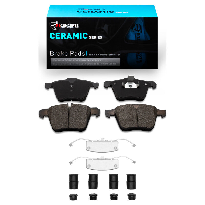 R1 Concepts OE front ceramic brake pads and hardware kit for Jaguar XF 2010-2019, showing assembled brake components.