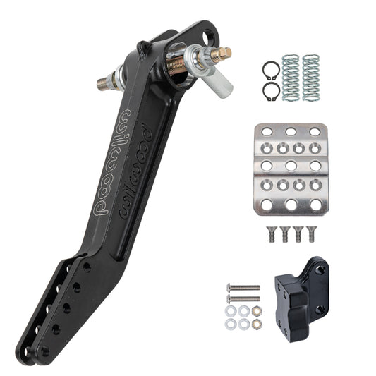 Wilwood dual brake pedal kit with adjustable ratio 6.25-7:1 and trunnion for forward mounting, designed for performance vehicles.