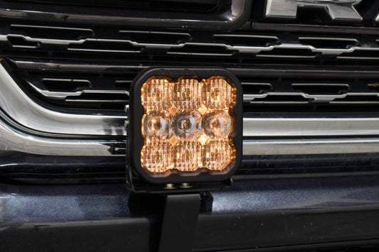 Diode Dynamics SS5 bumper bracket kit for 2019-present Ram trucks, shown mounted on vehicle bumper for LED light installation.