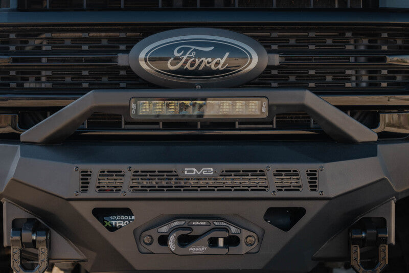 Steel front bumper for Ford Super Duty F-250/F-350 by DV8 Offroad, part of the Spec Series, rugged off-road design.