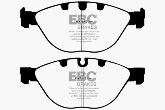 EBC Redstuff front brake pads for BMW M5 E60 5.0 performance braking system, showing new red brake pad material.