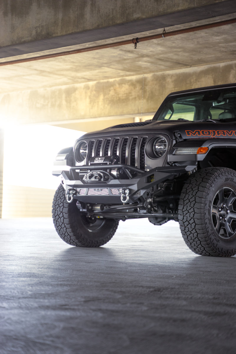Steel front bumper for Jeep Wrangler JK, JL, and Gladiator JT by DV8 Offroad, featuring rugged design and off-road durability.