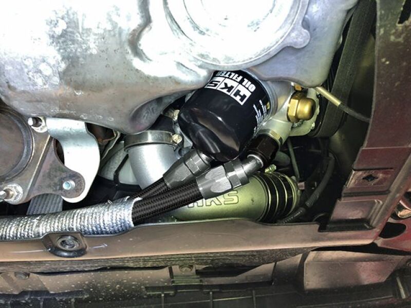 HKS S-Type Oil Cooler Kit for FK8 Civic Type-R, black finish, showcasing the sleek oil cooler with hoses and mounting hardware.