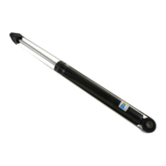 Bilstein B4 rear shock absorber installed on a 2009 Volkswagen Tiguan Comfortline, showing the shock's metal body and mounting points.