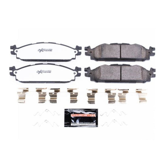 PowerStop Z36 performance front brake pads with hardware installed on a Ford Explorer, showing the brake pad design and packaging.