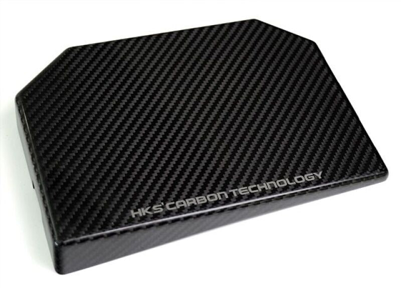 HKS 2023 Toyota GR Corolla dry carbon engine bay fuse box cover showing sleek carbon fiber finish and precise fit