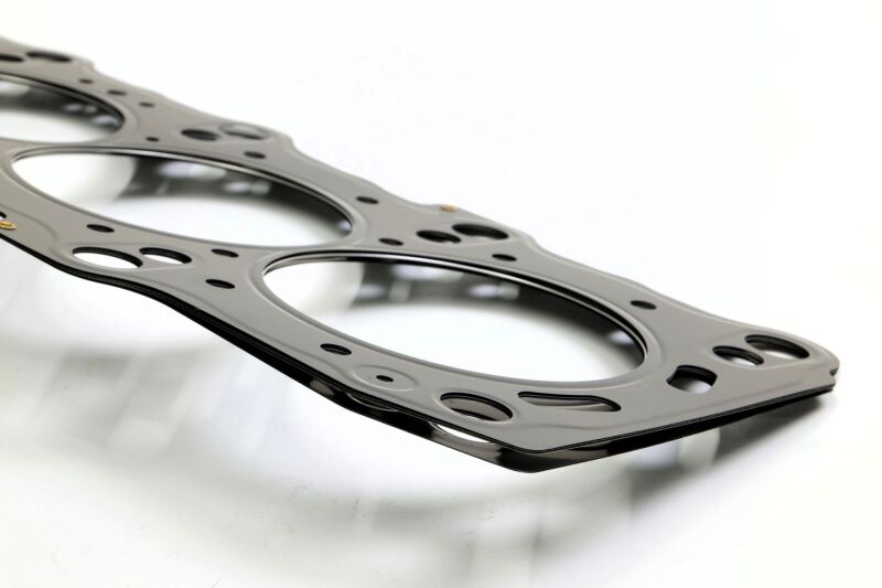 HKS Type Head Gasket for 2JZ engine, 1.0mm thickness, showcasing the metal gasket with HKS branding for performance engine sealing.