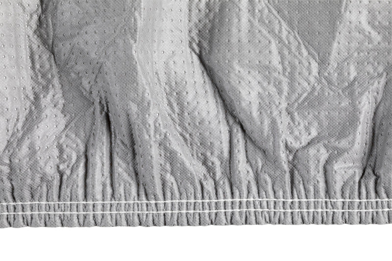 Gray Covercraft 27 Kia Telluride custom 5-layer indoor car cover protecting the vehicle from dust and scratches.