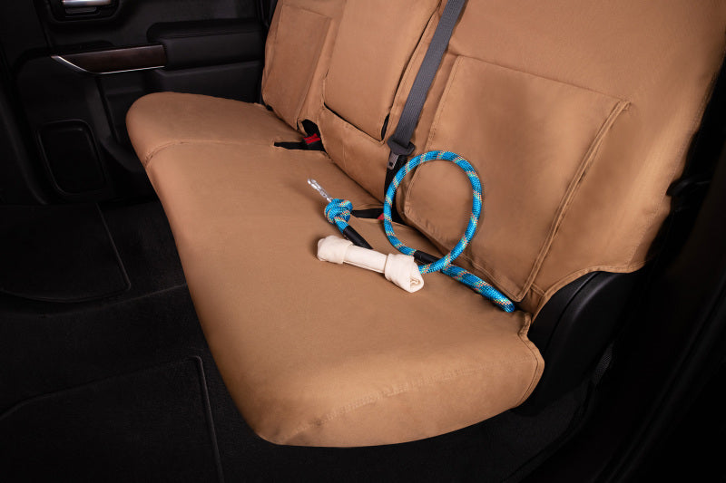 Covercraft tan polycotton seat covers for 2010-2013 Chevrolet 1500 front seats, custom-fit for protection and style.