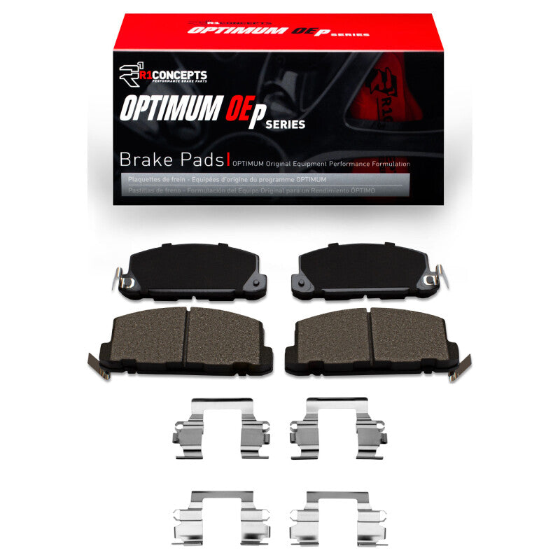 R1 Concepts R1 86-86 Isuzu Trooper front OE brake pads and hardware kit showing new brake pads and hardware components.