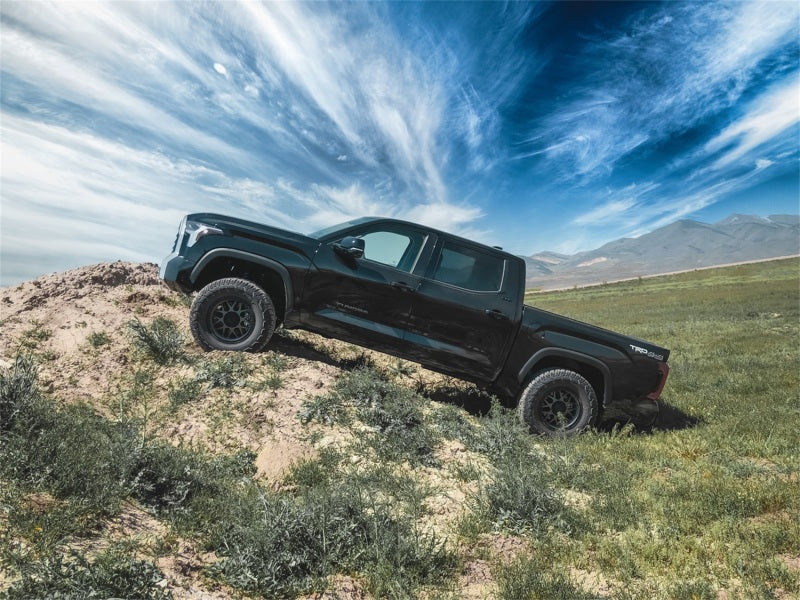 Tuff Country 2-inch leveling kit installed on a 2022 Toyota Tundra and 2023 Sequoia, showing front suspension adjustment