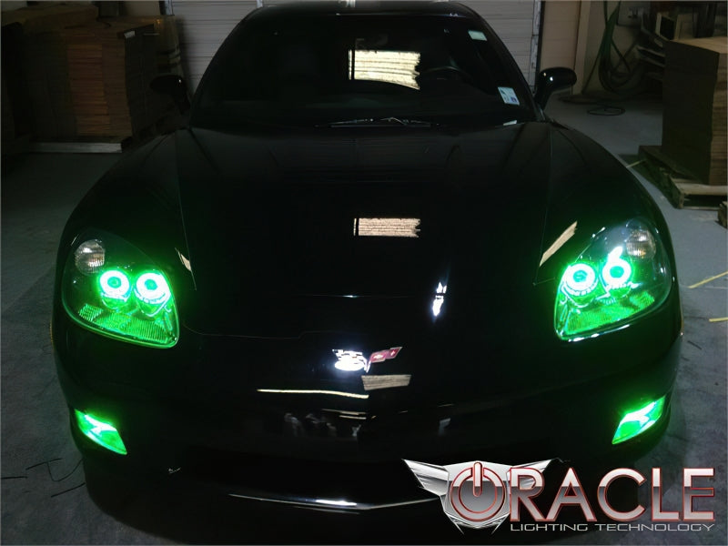 Oracle Chevrolet Corvette C6 LED Fog Light Halo Kit with green rings installed on fog lights for C6 Corvette models.
