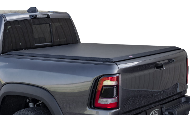 Access Limited roll-up truck bed cover for Dodge Dakota Crew Cab 5ft 4in bed with utility rail, exterior truck bed accessory.