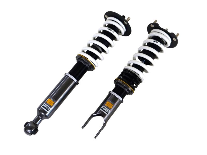 HKS HIPERMAX S FD3S coilover suspension kit installed on a Mazda RX-7 FD3S, showcasing adjustable shocks and lowered stance.