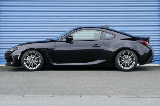 HKS Hipermax S ZD8 coilover suspension kit installed on a Subaru BRZ, showcasing adjustable shocks and performance features.