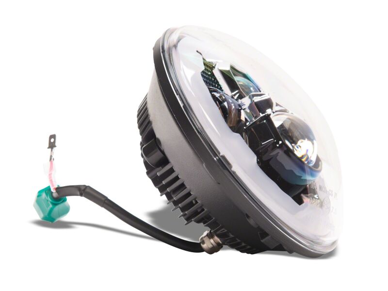 Raxiom 07-18 Jeep Wrangler LED headlights with black housing, clear lens, DRL, and 7-inch size for enhanced visibility.