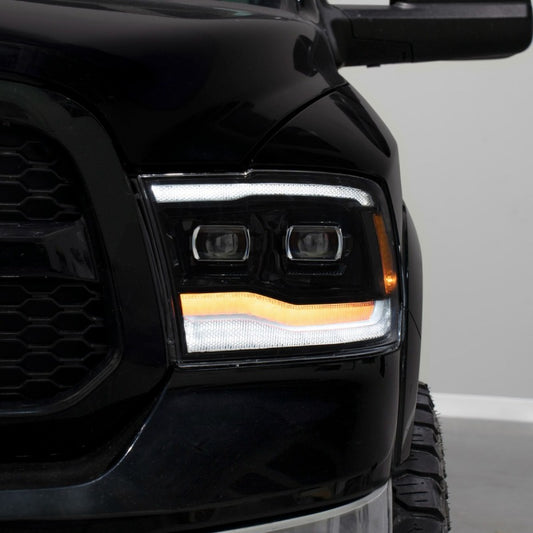 Pair of FORM Lighting sequential LED projector headlights for 2009-2018 Ram 1500, 2500, 3500 trucks, showcasing modern headlight design.