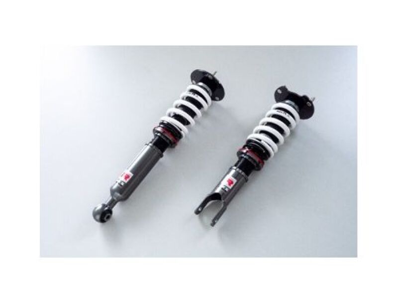 HKS Hipermax R FD3S coilovers installed on a Mazda RX-7, showcasing adjustable suspension components and performance tuning.