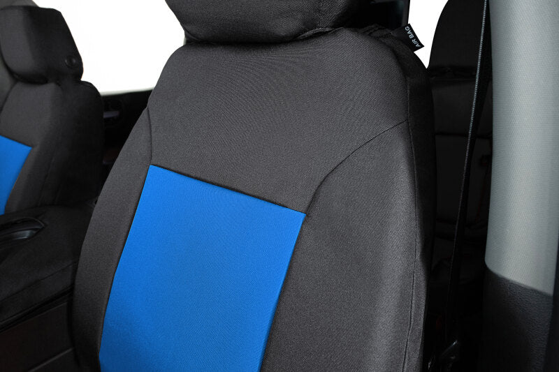 Covercraft blue and black custom second row seat covers for Ford Expedition 2021-2024, made for a precise fit and durable protection.