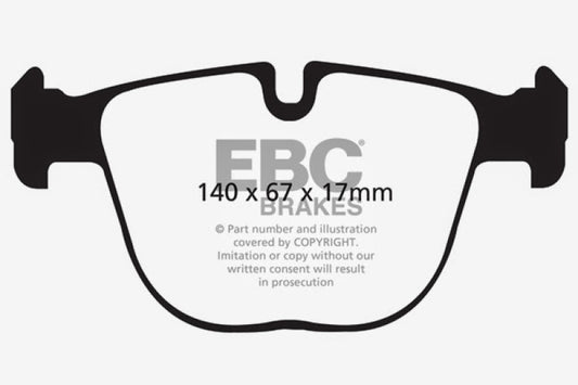 EBC 10+ BMW X5M 4.4 Twin Turbo Redstuff performance rear brake pads installed on the vehicle.