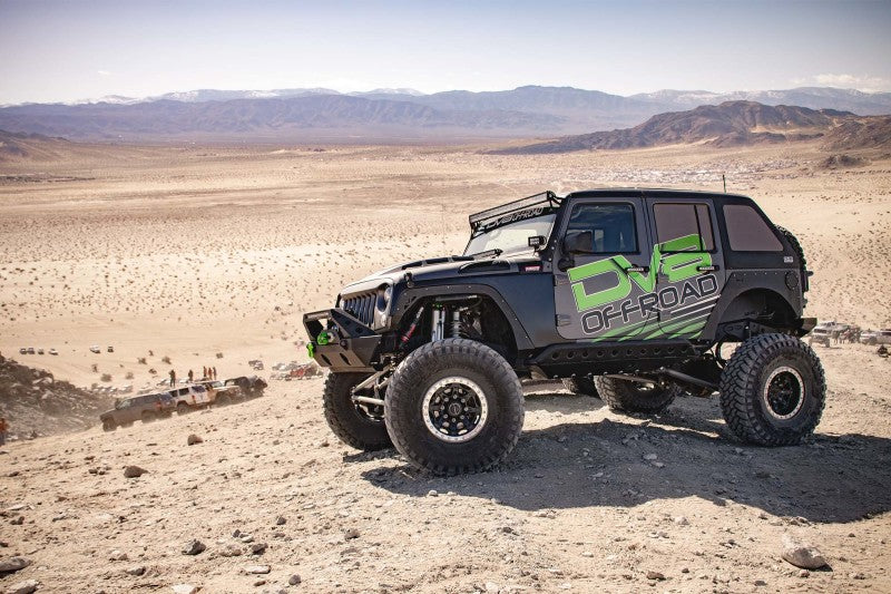 DV8 Offroad Jeep Wrangler JK metal heat dispersion hood in primer black, showcasing its rugged design and vented construction.