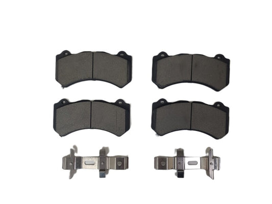 Baer Brakes 15-22 Dodge Challenger Claw performance brake pads, close-up view showing black friction material and metal backing plates.