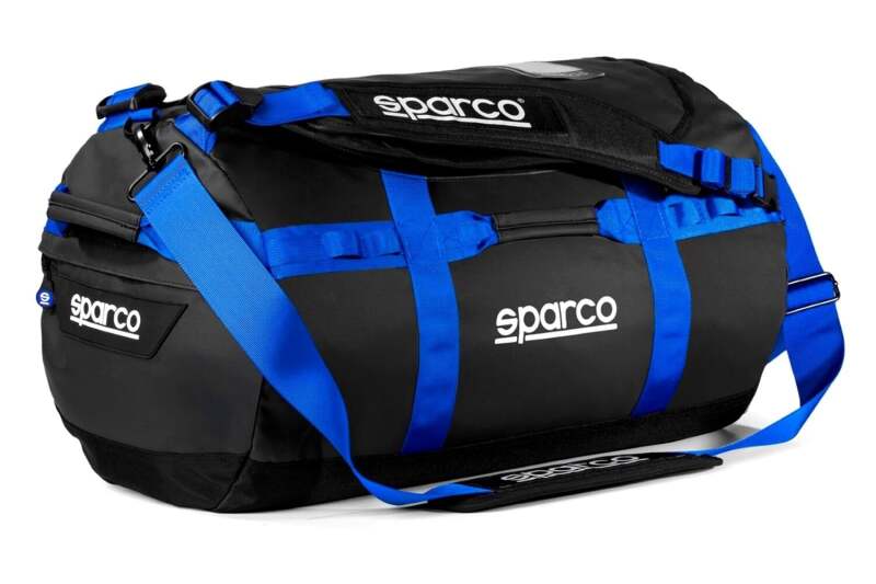 Large black and blue Sparco Dakar duffle bag with handles and zip closure, designed for travel and luggage.