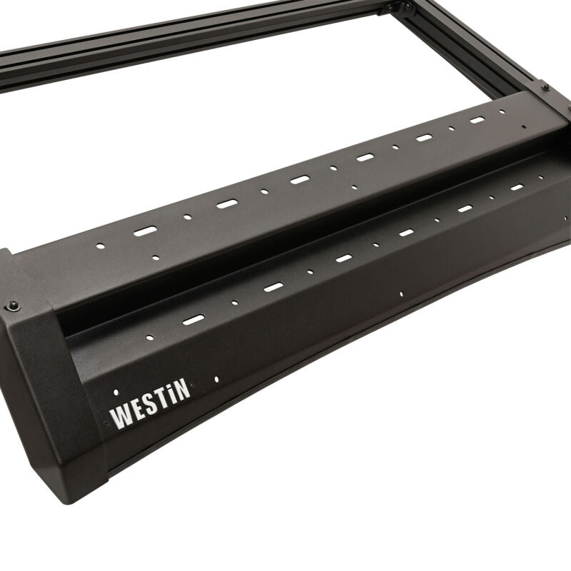 Westin 25-26 Toyota 4Runner Mesa roof rack mounted on vehicle roof, durable steel construction for cargo transport.