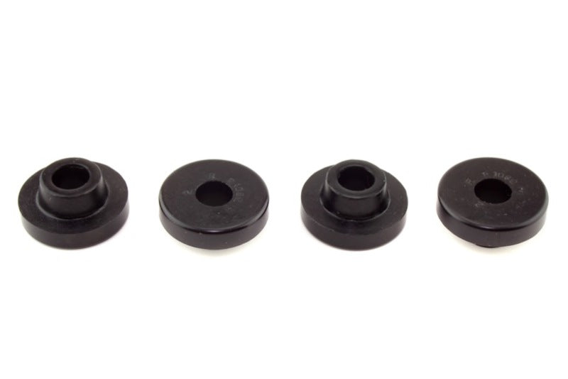 Whiteline Plus Mazda 323 RX3 RX4 front sway bar bushings installed on control arm, demonstrating automotive suspension component.