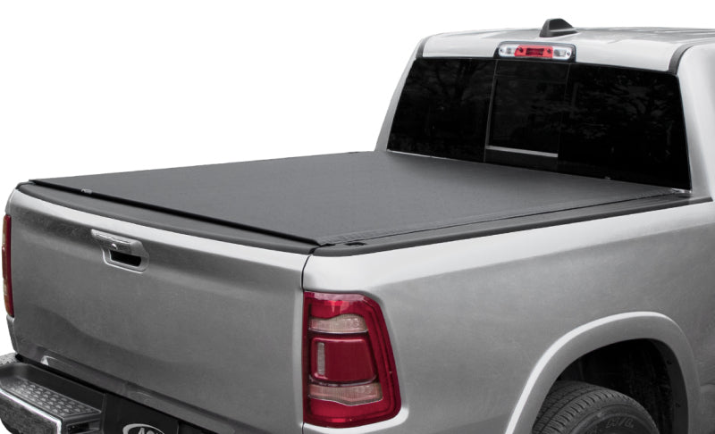 Access Tonnosport roll-up truck bed cover on Dodge Ram 1500 Quad and Regular Cab with 8ft bed, exterior truck bed accessory.