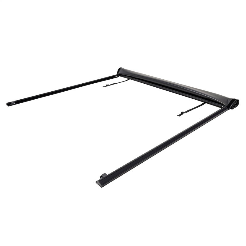 Westin 2024 Toyota Tacoma 6ft bed soft roll-up tonneau cover in black, shown rolled up on truck bed for secure cargo protection.