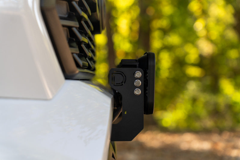 Diode Dynamics 2024 Toyota Tacoma SS5 grille crosslink lightbar kit with sport white combo lights on a truck grille.