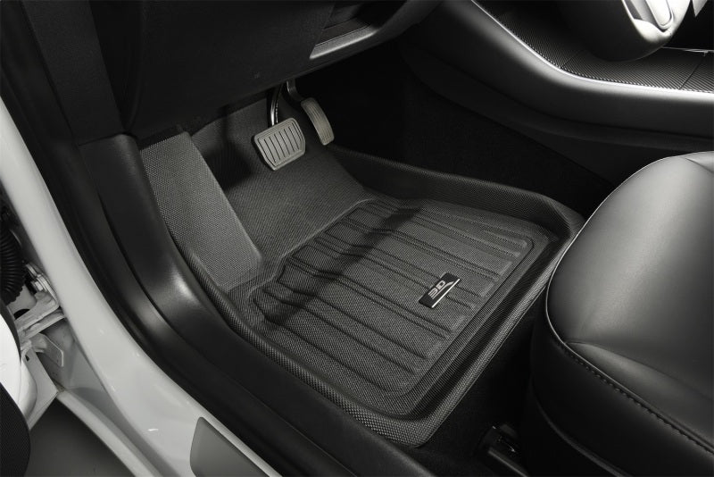 3D MAXpider black rubber floor mats for Tesla Cybertruck 24-26, full set with textured surface and custom fit.