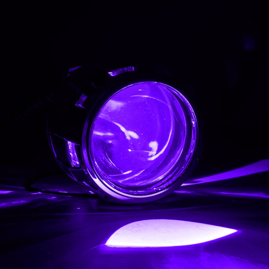 Oracle Lighting Demon Eye Projector Illumination Kit headlights with ColorSHIFT feature, showcasing vibrant, customizable LED lighting on vehicle.