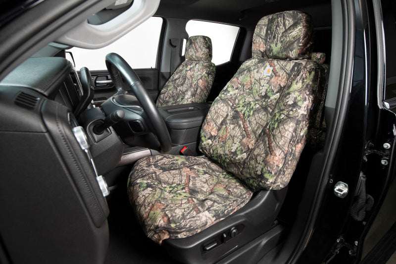 Covercraft Carhartt Camo front seat covers for Dodge Nitro 2007-2009, custom-fit seat protection with durable camouflage fabric.