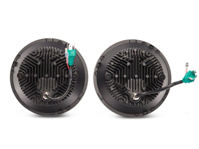 Raxiom 07-18 Jeep Wrangler LED headlights with black housing, clear lens, DRL, 7-inch size, designed for off-road vehicles